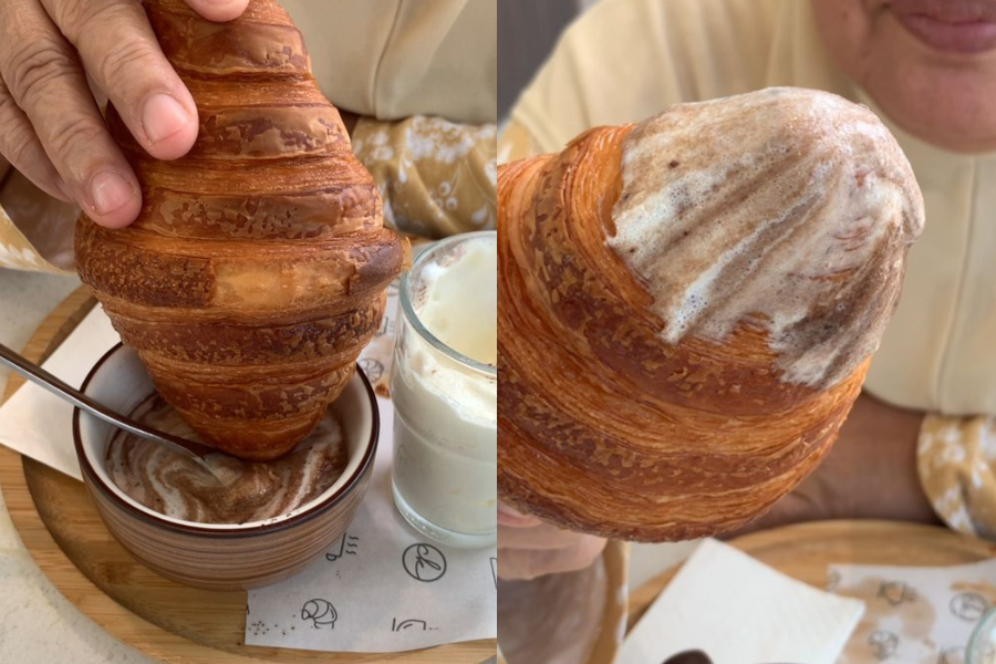 Croissant dihidangkan bersama coklat panas dan whipping cream.