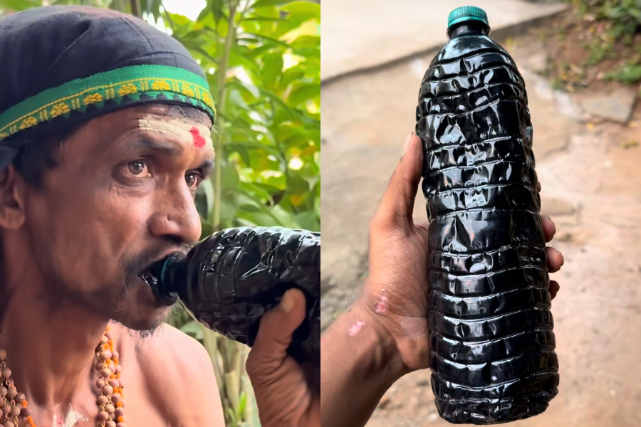 Minyak enjin dimasukkan ke dalam botol air mineral.