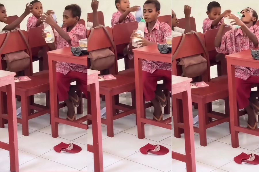 Momen sederhana murid di sebuah sekolah di pedalaman Papua menggunakan bekas botol pencuci pinggan sebagai botol minuman.