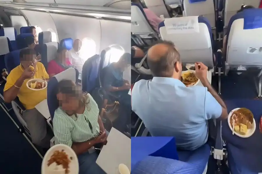 Keluarga ini dilihat gembira saat menikmati makanan yang dibawa sendiri dari rumah.