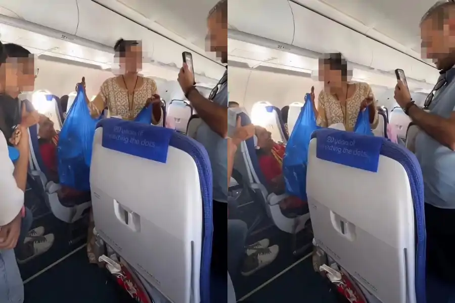 Salah seorang mereka dilihat membawa beg plastik dan mengutip semula sampah bekas makanan.